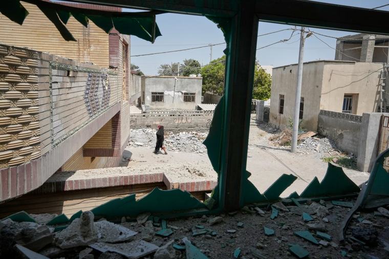 Photos show destruction and mourning after a strike on an Iranian wedding